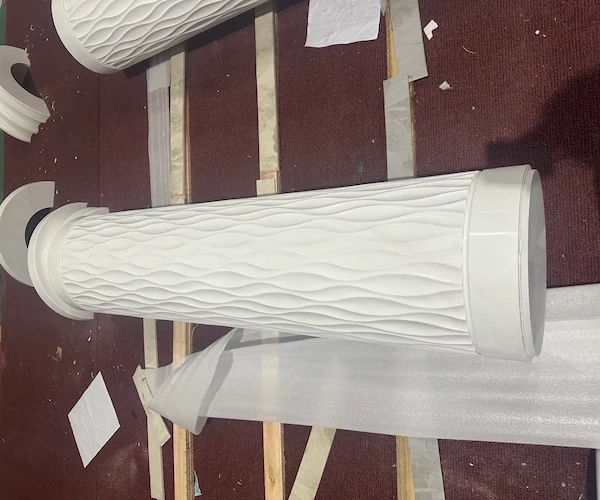 White Marble fluted shaft and base components arranged for factory alignment review