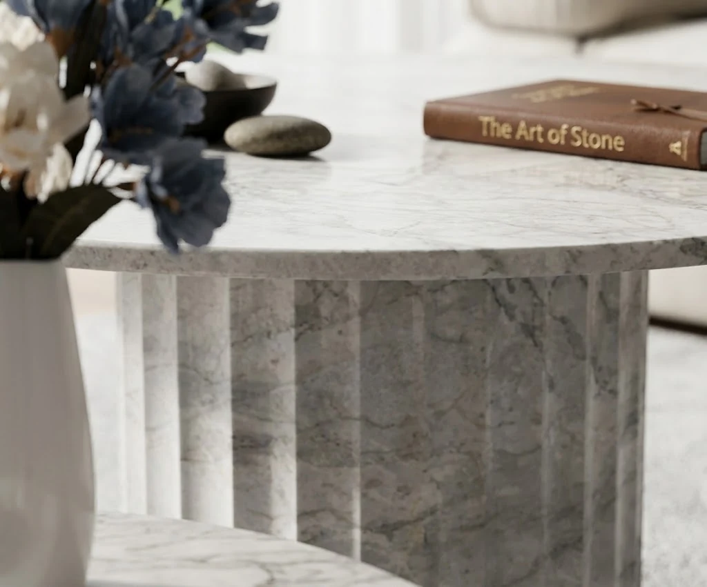 3D visualization of a round white marble coffee table beside upholstered seating in a living room concept