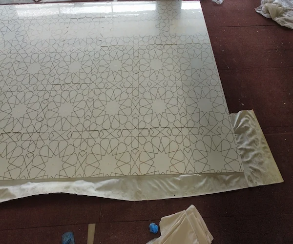 White Marble Waterjet Inlay with Brass Lines shown in a supplied factory dry-lay layout reference image