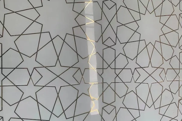 White Marble Waterjet Inlay with Brass Lines shown in a supplied production detail reference image