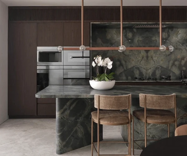 3D visualization of a Wizard of Oz Quartzite waterfall kitchen island in a contemporary interior