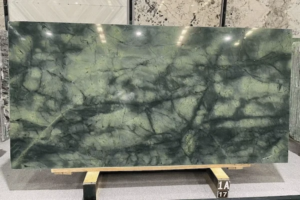 Wizard of Oz Quartzite surface check showing pale mineral transitions and fine dark linear movement
